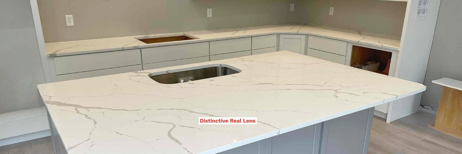 Real Distinctive Kitchen project featuring a Calacatta Laza quartz island